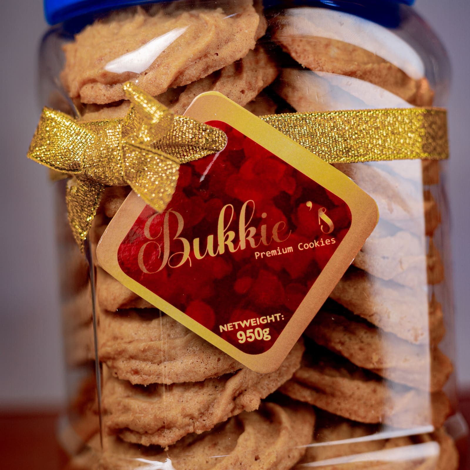 Bukkie's jar with gold ribbon and label
